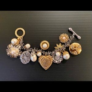 Beautiful charm bracelet with three lockets.